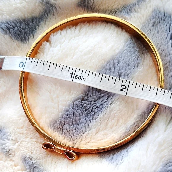 Kate Spade Gold-tone Bow Clamper Bracelet - Picture 4 of 5